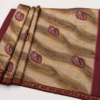 2026/07/1000440365.png Premium Beige & Maroon Printed Silk Blend Saree with Elegant Designer Border